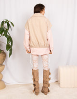 Fluffy sleeveless high collar jacket