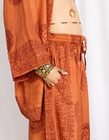 Handmade om print wide leg trousers