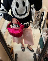 Knitted smiley sweater