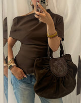 Asymmetric off shoulder smocked top