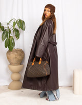 Long faux leather belted coat