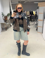 Oversized vegan leather motor race bomber jacket