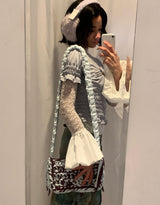 Lace top with flared cuffs