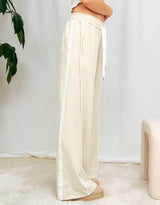 Wide leg drawstring trousers with side detail