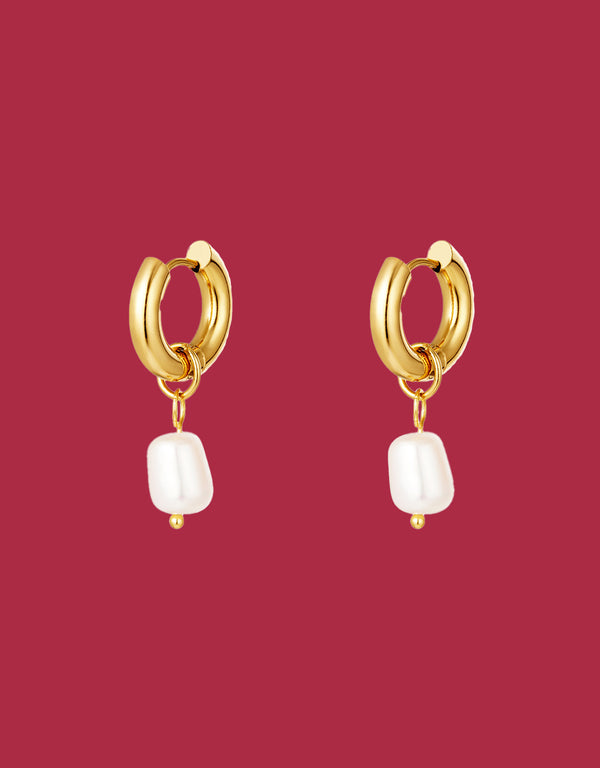Dangling pearl earrings