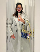 Double breasted belted coat