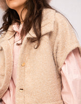 Fluffy sleeveless high collar jacket