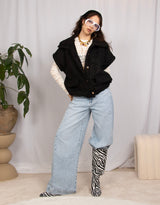 Fluffy sleeveless high collar jacket