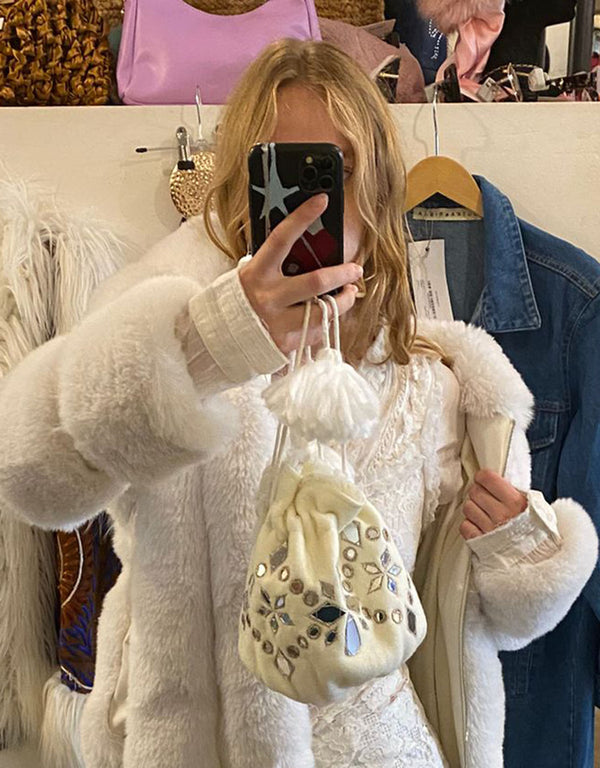 Free people Handcrafted sequin polti bag with pom-poms