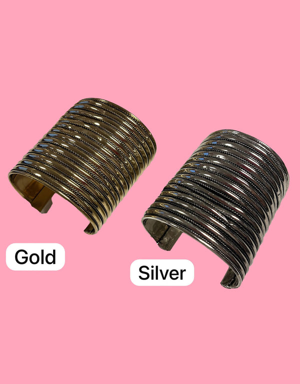 Handcrafted striped motive statement cuff