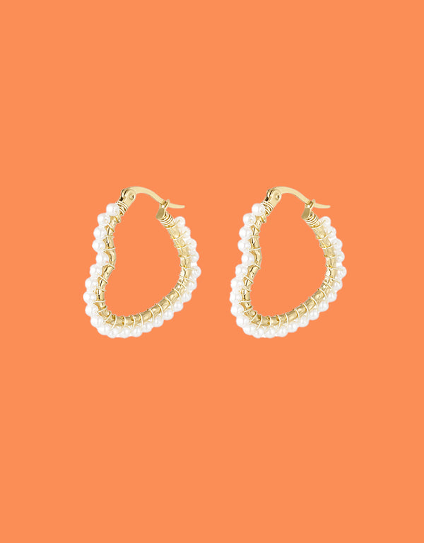 Heart shaped pearl hoop earrings