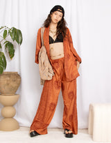 Handmade om print wide leg trousers