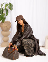 Long faux leather belted coat