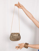 Handcrafted statement studded chain bag