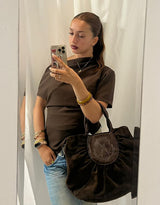 Asymmetric off shoulder smocked top