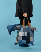 Vintage customized denim patches bag with closure