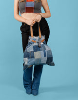 Vintage customized denim patches bag with closure