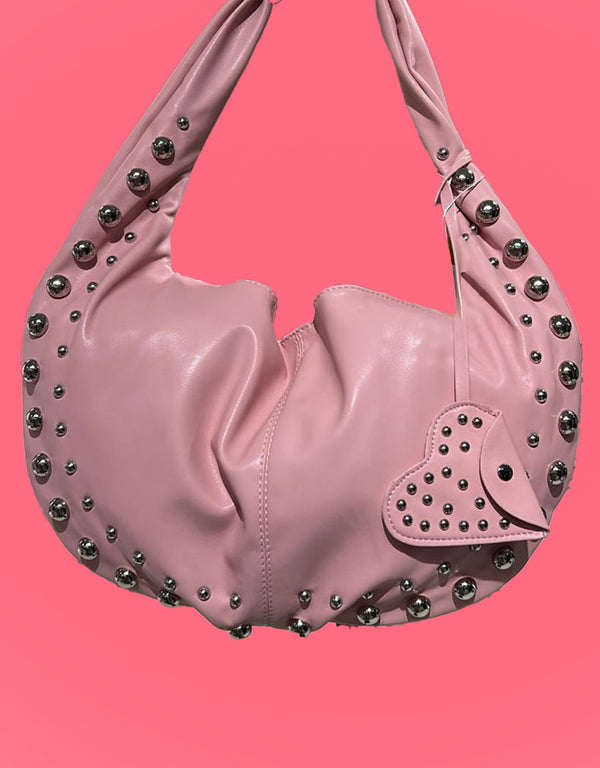 Round bag with studs and mini heart pouch