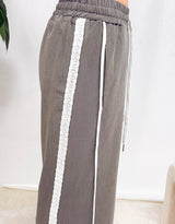 Wide leg drawstring trousers with side detail
