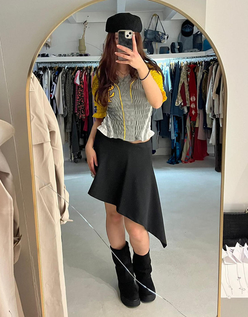 Asymmetric skirt