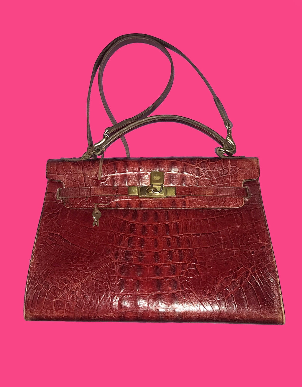 LOT:337  MULBERRY - a vintage Kelly-style handbag.