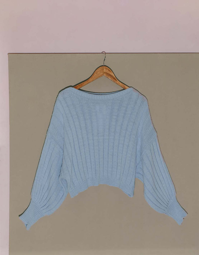 Cropped cable sweater