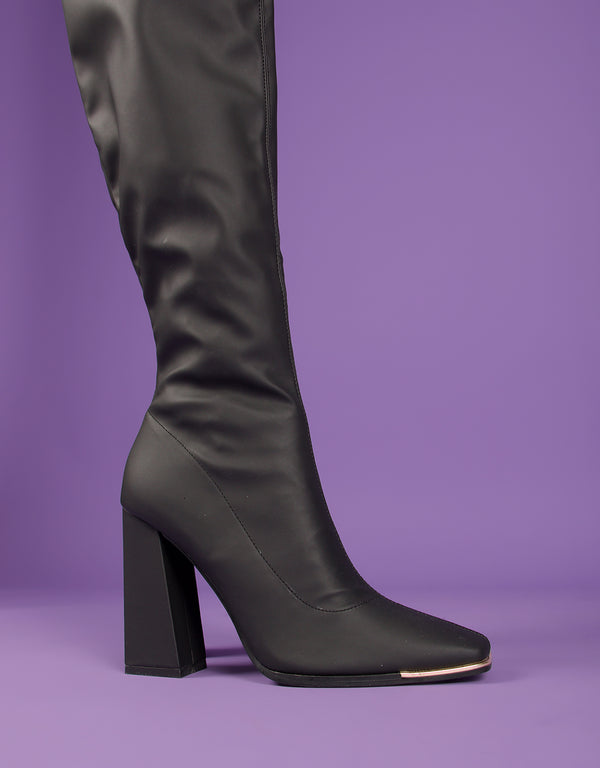 Knee high heeled sock boots