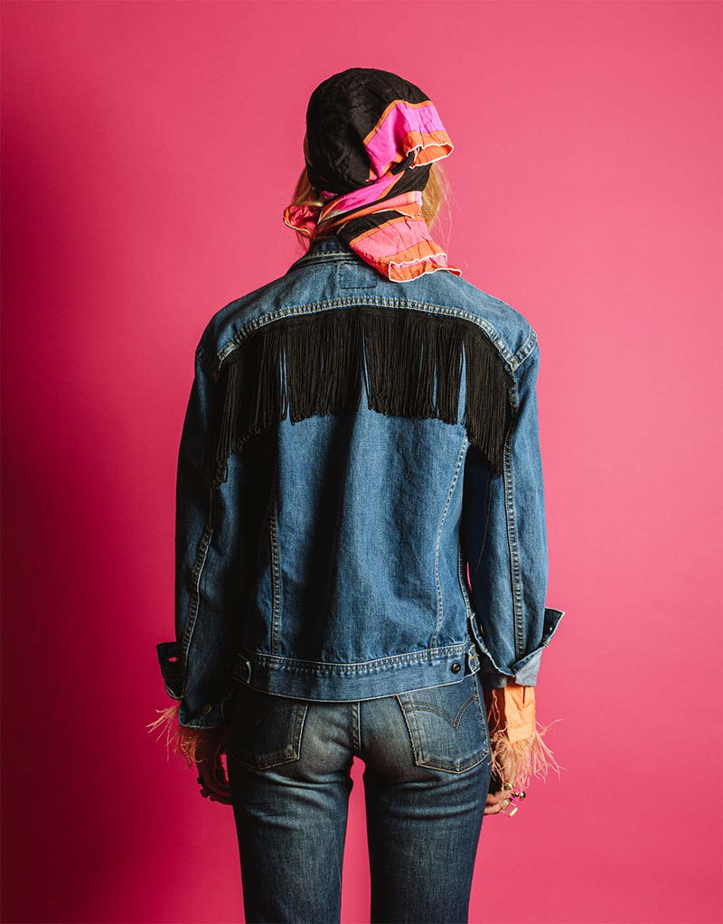 Vintage customized denim jacket with fringes