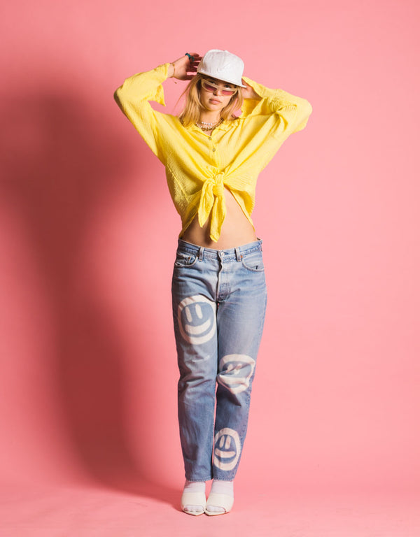 Vintage customized levi’s smiley jeans